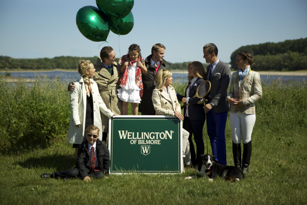 Wellington of Bilmore family with logo by the lake