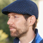 Harris Tweed Mütze ''Henry Cap'' in blau-schwarzem Hahnentritt