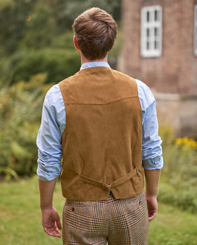 Tailor - Men's leather vest made from super soft goat suede in mud - Back view | Wellington of Bilmore