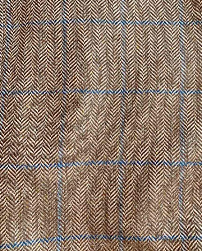 6143- Herringbone pattern with blue overcheck